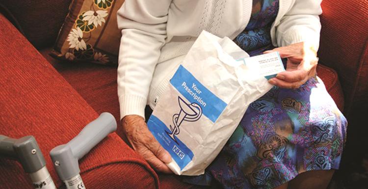 Older Woman with Prescription at Home
