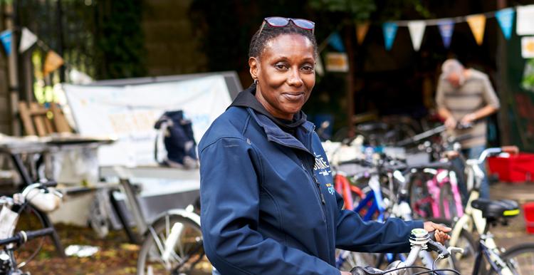 A woman working with bicycles