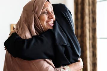 Muslim Women Hugging 