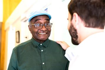 Smiling Black Man - Reach and Connect Smiling Black Man